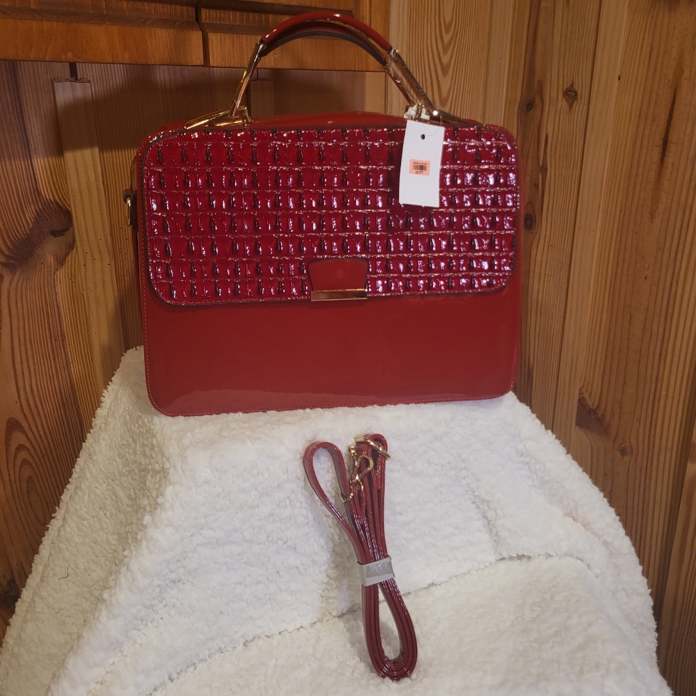 J. Francis red high gloss briefcase/purse. NWOT, strap included, gold accents